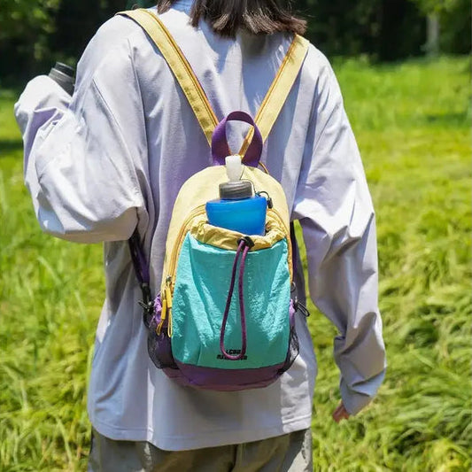 🎒Unisex Color Block Mini Backpack – Lightweight Water-Resistant Nylon Daypack